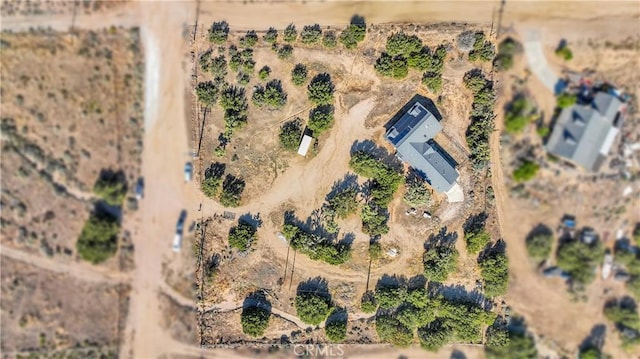 10634 Mesquite St, Oak Hills, CA 92344 - birds eye view of property featuring view of desert and a rural view