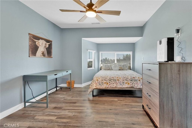 10634 Mesquite St, Oak Hills, CA 92344 - bedroom featuring a ceiling fan, baseboards, and wood finished floors