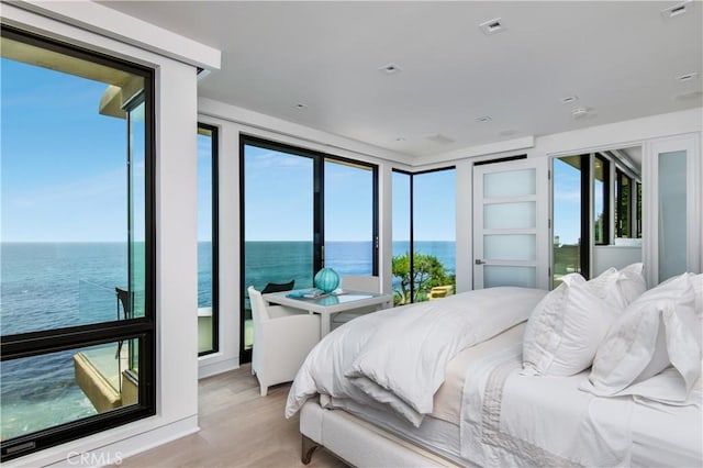 1715 Ocean Way, Laguna Beach, CA 92651 - bedroom with a water view, light wood finished floors, and access to exterior