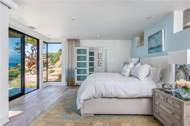 1715 Ocean Way, Laguna Beach, CA 92651 - bedroom with wood finished floors and access to outside
