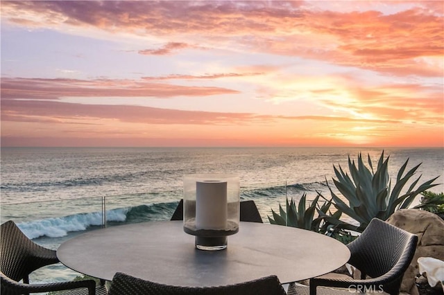 1715 Ocean Way, Laguna Beach, CA 92651 - patio terrace at dusk featuring a water view and outdoor dining area