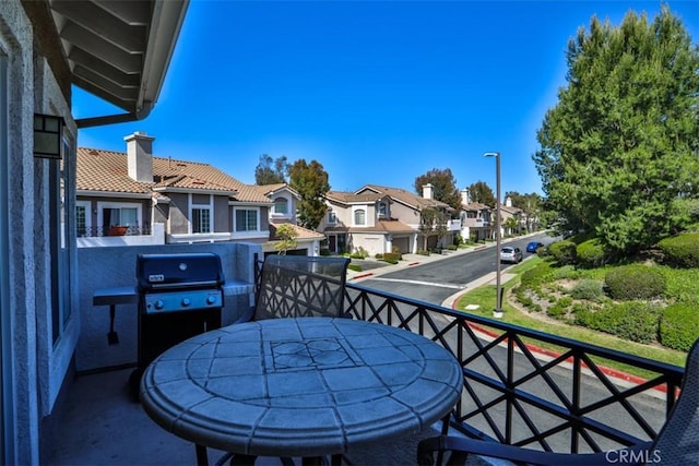 balcony featuring a residential view and area for grilling