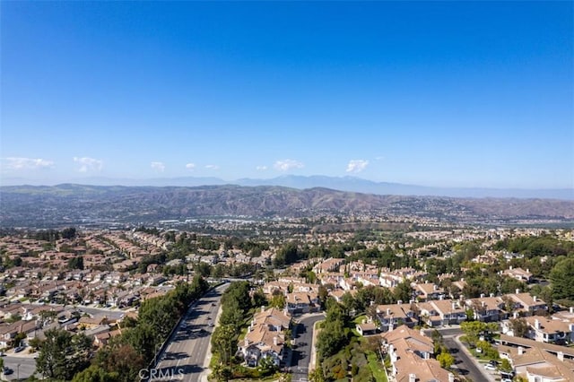 bird's eye view featuring a residential view and a mountain view
