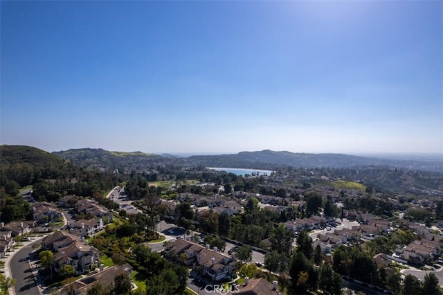 aerial view featuring a mountain view and a residential view