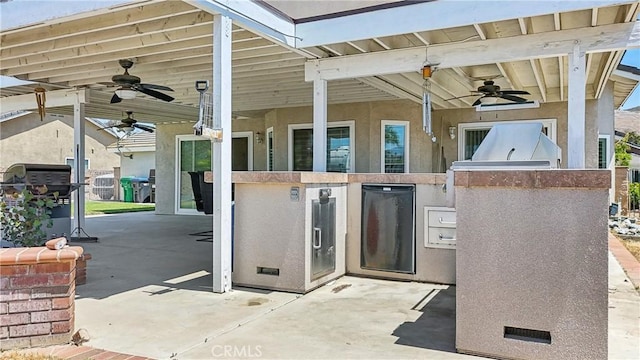 view of patio / terrace featuring ceiling fan and area for grilling