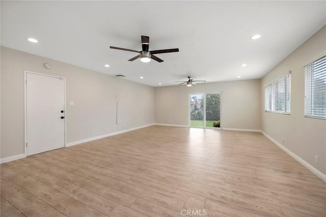 unfurnished room featuring visible vents, light wood-style floors, baseboards, ceiling fan, and recessed lighting