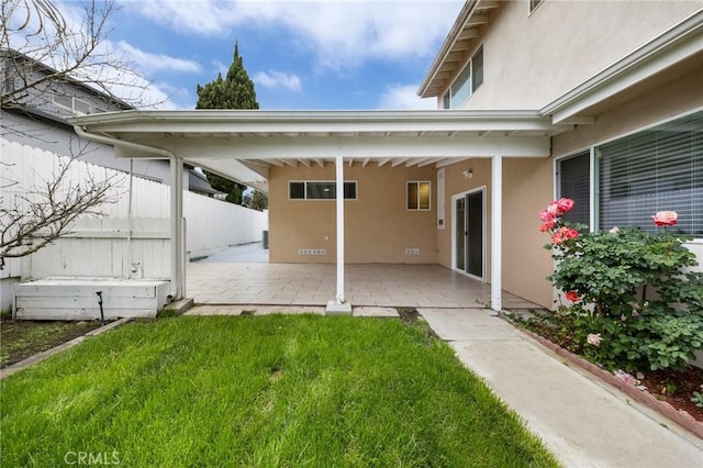 view of yard with a patio and fence