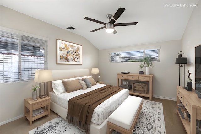 bedroom featuring baseboards, a ceiling fan, vaulted ceiling, and visible vents