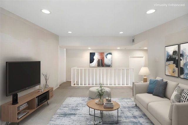 living room featuring light carpet and recessed lighting