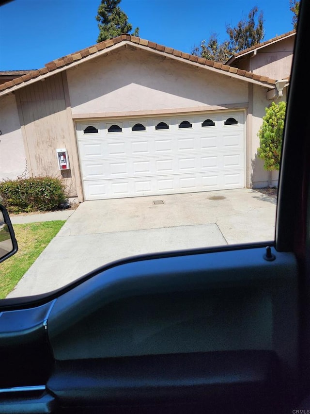 garage with driveway