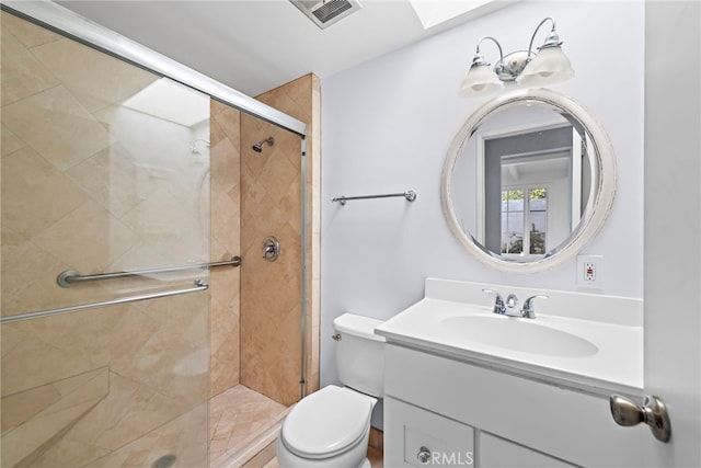 full bath featuring visible vents, a stall shower, toilet, and vanity