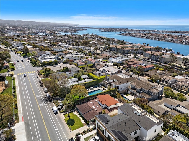 aerial view with a water view and a residential view