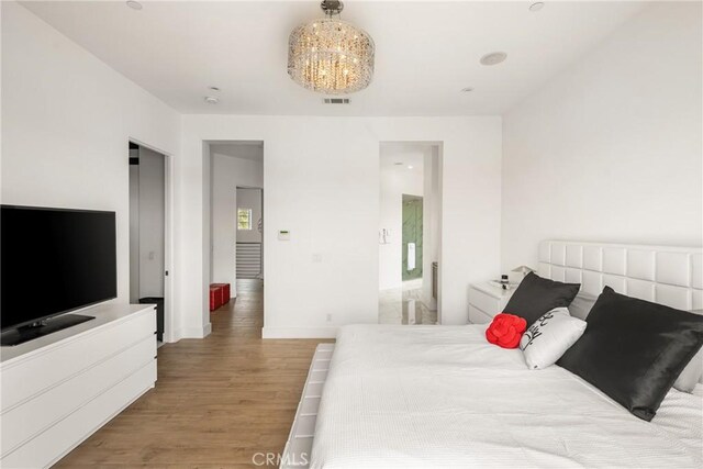 21 Alexa Ln, Ladera Ranch, CA 92694 - bedroom with wood finished floors and baseboards
