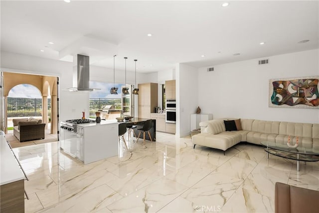 21 Alexa Ln, Ladera Ranch, CA 92694 - living area featuring plenty of natural light, recessed lighting, and light marble finish floors