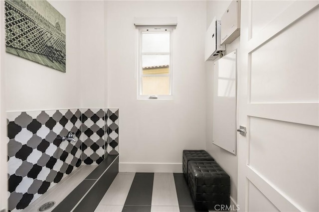 21 Alexa Ln, Ladera Ranch, CA 92694 - bathroom featuring baseboards and tile patterned flooring