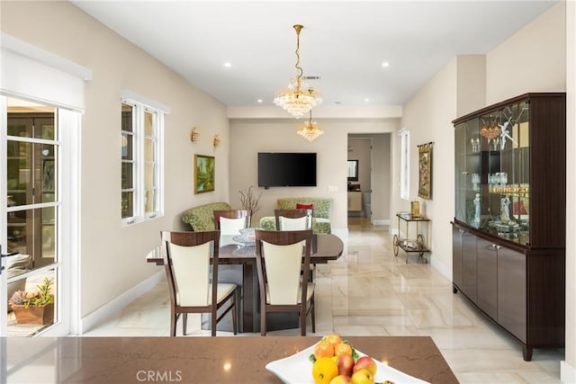 21 Alexa Ln, Ladera Ranch, CA 92694 - dining area with a chandelier, recessed lighting, and light marble finish flooring