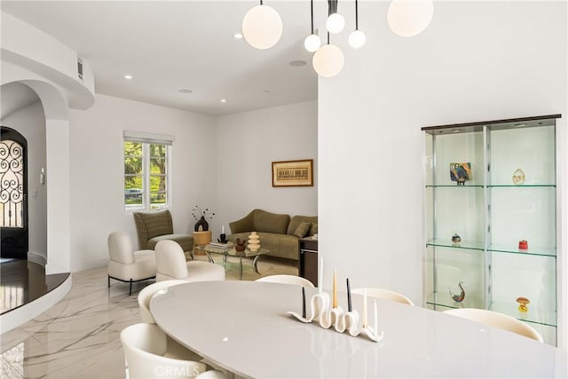 21 Alexa Ln, Ladera Ranch, CA 92694 - dining room featuring marble tiled floors, recessed lighting, and arched walkways