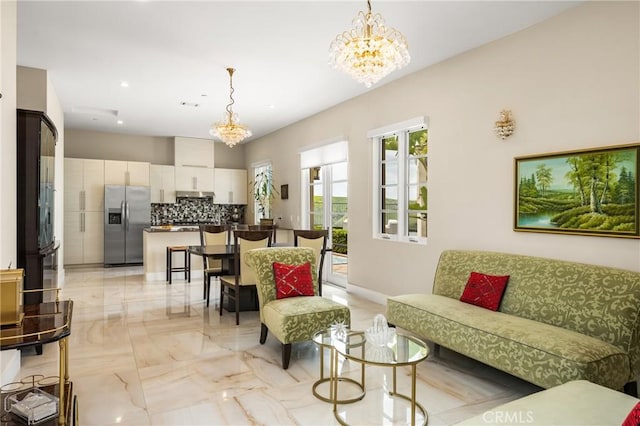 21 Alexa Ln, Ladera Ranch, CA 92694 - living area with a chandelier and light marble finish flooring