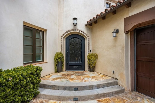 21 Alexa Ln, Ladera Ranch, CA 92694 - entrance to property featuring stucco siding