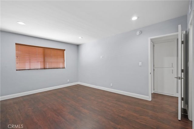 5414 Newcastle Ave Unit 66, Encino, CA 91316 - empty room with dark wood-style flooring, baseboards, recessed lighting, and a smoke detector