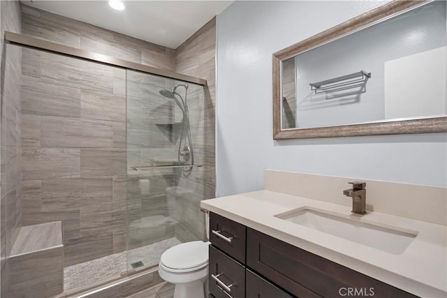 5414 Newcastle Ave Unit 66, Encino, CA 91316 - full bathroom featuring a shower stall, toilet, vanity, and recessed lighting