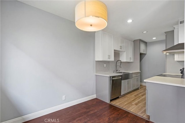 5414 Newcastle Ave Unit 66, Encino, CA 91316 - kitchen with a sink, stainless steel dishwasher, gray cabinets, wall chimney exhaust hood, and recessed lighting