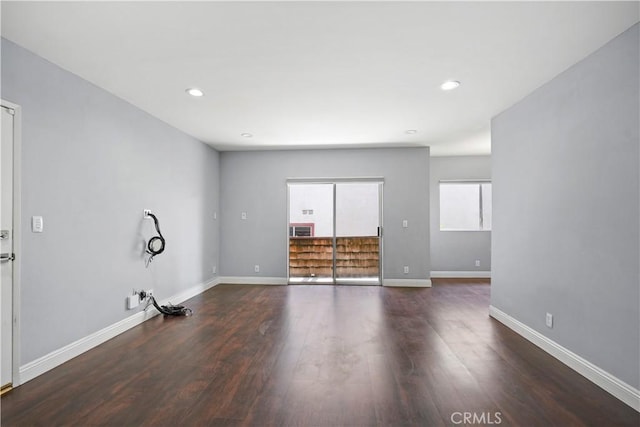 5414 Newcastle Ave Unit 66, Encino, CA 91316 - unfurnished living room featuring wood finished floors, baseboards, and recessed lighting