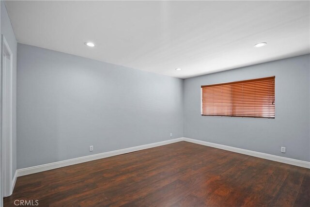 5414 Newcastle Ave Unit 66, Encino, CA 91316 - empty room featuring baseboards, wood finished floors, and recessed lighting