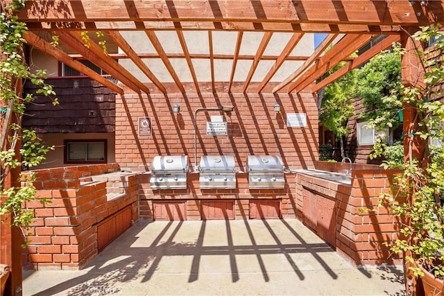 5414 Newcastle Ave Unit 66, Encino, CA 91316 - view of patio featuring a pergola and a sink