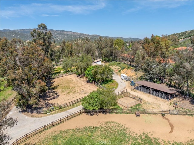 birds eye view of property featuring a rural view and a mountain view