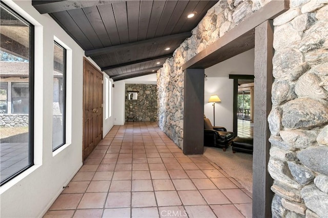 hallway with recessed lighting, lofted ceiling with beams, and wood ceiling