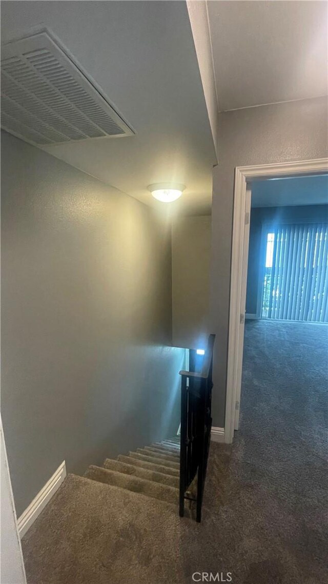 1045 Peach Ave Unit 17, El Cajon, CA 92021 - stairway with baseboards, carpet flooring, and visible vents