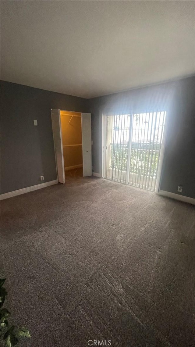 1045 Peach Ave Unit 17, El Cajon, CA 92021 - carpeted spare room with baseboards