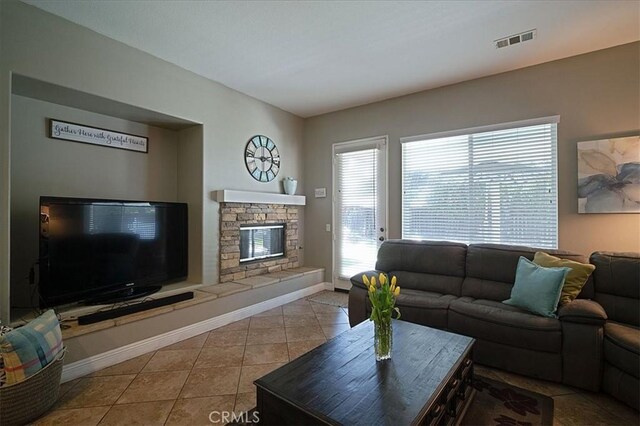 31961 Honeysuckle Cir, Winchester, CA 92596 - tiled living area featuring baseboards and a fireplace
