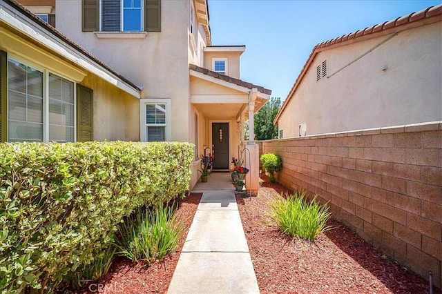 31961 Honeysuckle Cir, Winchester, CA 92596 - entrance to property featuring stucco siding and fence