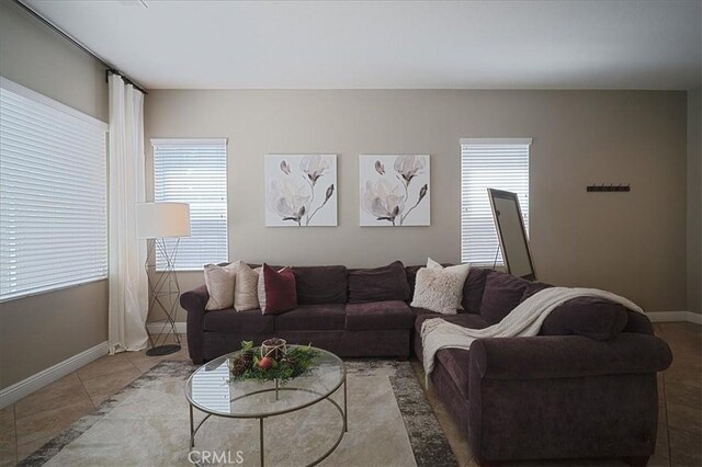 31961 Honeysuckle Cir, Winchester, CA 92596 - tiled living room with baseboards