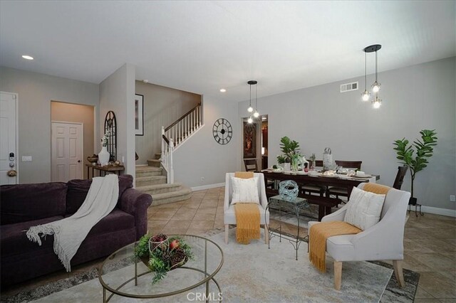 31961 Honeysuckle Cir, Winchester, CA 92596 - living room with stairway, baseboards, recessed lighting, and light tile patterned flooring
