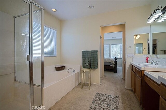 31961 Honeysuckle Cir, Winchester, CA 92596 - ensuite bathroom with a garden tub, a shower stall, vanity, and recessed lighting