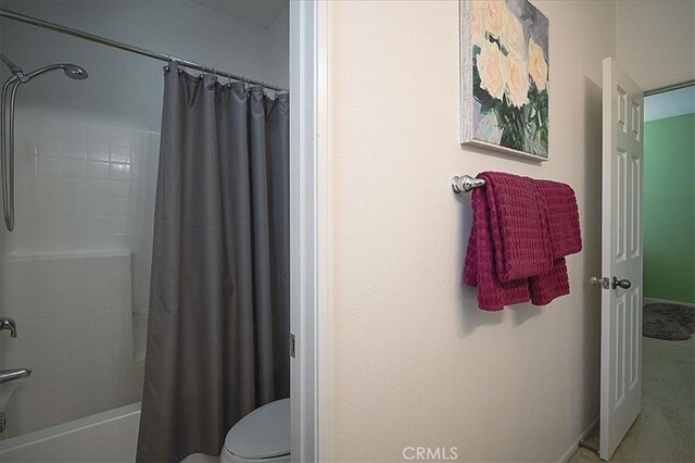 31961 Honeysuckle Cir, Winchester, CA 92596 - full bath featuring toilet, shower / tub combo with curtain, and baseboards
