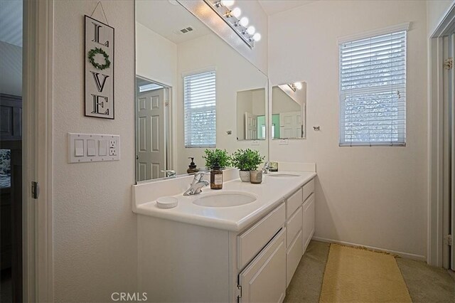31961 Honeysuckle Cir, Winchester, CA 92596 - full bath featuring double vanity and baseboards
