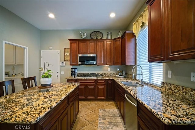 31961 Honeysuckle Cir, Winchester, CA 92596 - kitchen with stainless steel appliances, plenty of natural light, a sink, light stone counters, and recessed lighting
