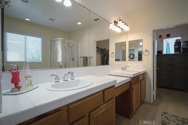 31961 Honeysuckle Cir, Winchester, CA 92596 - bathroom featuring a stall shower, a spacious closet, and double vanity