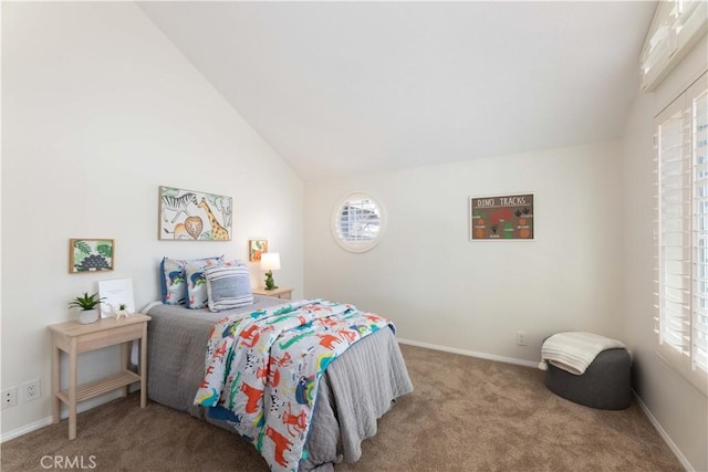 bedroom featuring carpet flooring, lofted ceiling, and multiple windows