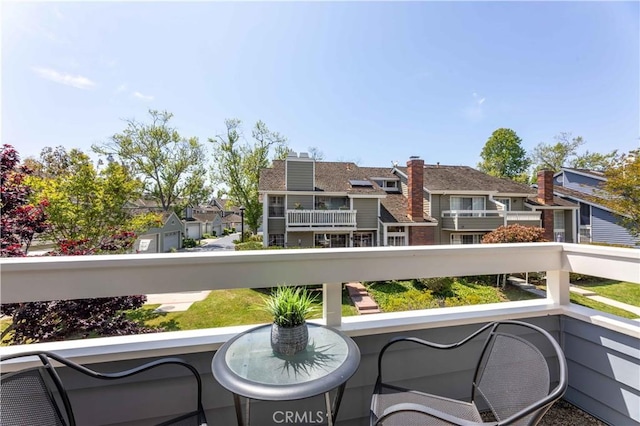 balcony featuring a residential view