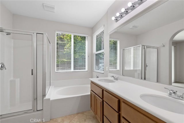 31937 Calle Galarza, Temecula, CA 92592 - full bathroom with a shower stall, a garden tub, double vanity, and tile patterned floors