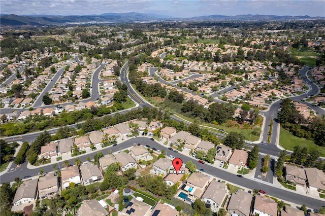 31937 Calle Galarza, Temecula, CA 92592 - aerial view of property's location with nearby suburban area and a mountain backdrop
