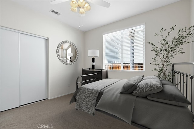 31937 Calle Galarza, Temecula, CA 92592 - bedroom with carpet, a closet, a ceiling fan, and baseboards