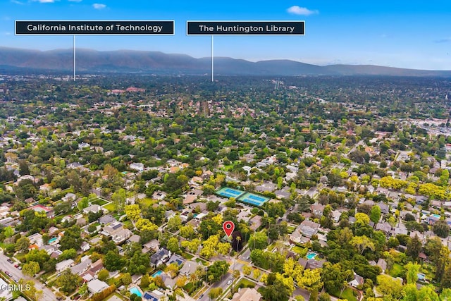 drone / aerial view featuring a mountain view
