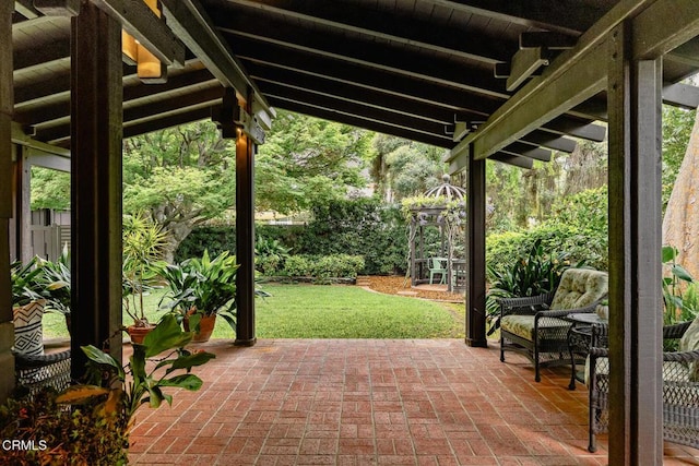 view of patio featuring fence
