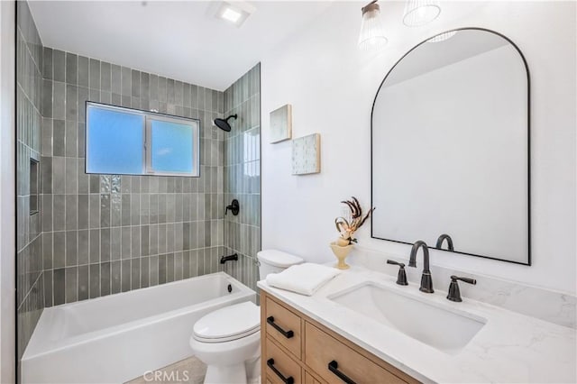 full bathroom featuring shower / bath combination, vanity, and toilet